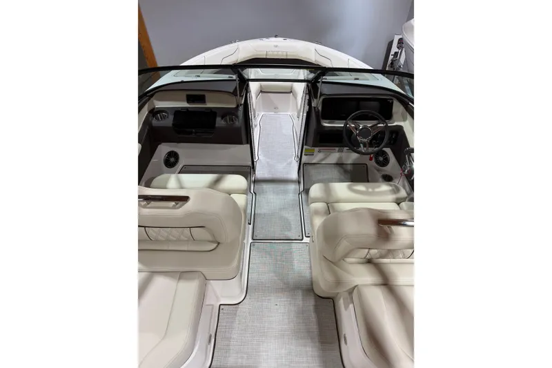 Slide: The Image of Interior view of 2026 Regal LS2 boat, featuring luxurious seating and modern dashboard. - 8