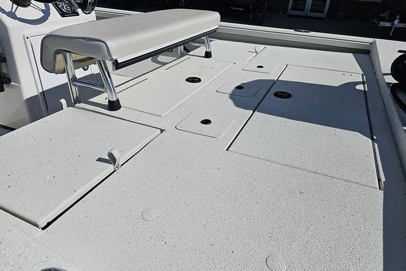 Slide: The Image of 2026 Ranger RB190 boat deck with storage compartments and seating. - 10