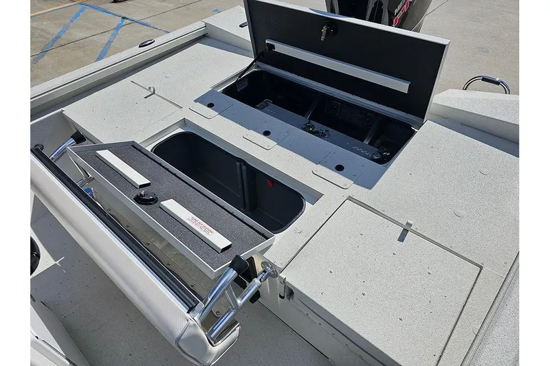 Slide: The Image of 2026 Ranger RB190 boat storage compartments open on deck, showcasing spacious design. - 11