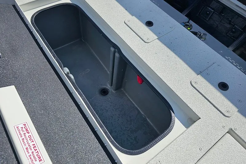 Slide: The Image of 2026 Ranger RB190 boat livewell with pump-out feature, gray interior, and textured surface. - 12