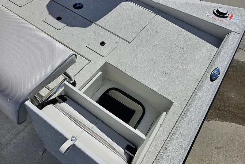Slide: The Image of 2026 Ranger RB190 boat interior with storage compartment and seating. - 13