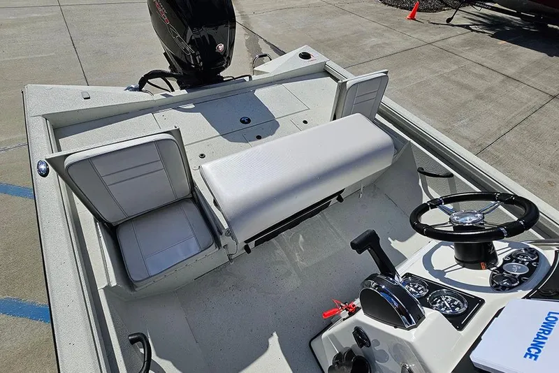 Slide: The Image of 2026 Ranger RB190 boat interior with steering wheel and seating. - 15