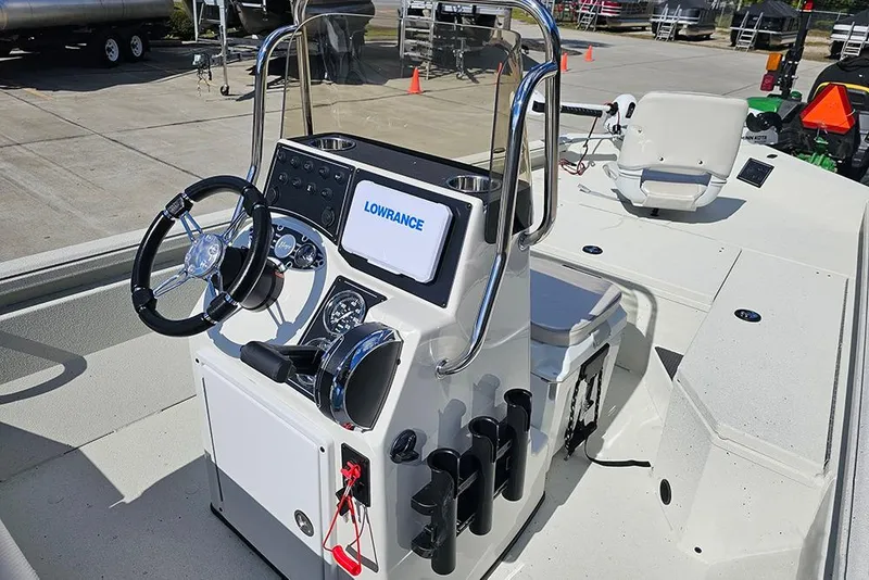 Slide: The Image of 2026 Ranger RB190 boat console with steering wheel and Lowrance display. - 16
