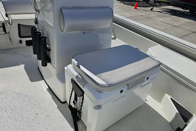 Slide: The Image of 2026 Ranger RB190 boat interior with cushioned seat and rod holders. - 18