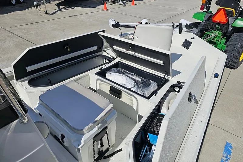 Slide: The Image of 2026 Ranger RB190 boat interior with storage compartments and equipment on display. - 20