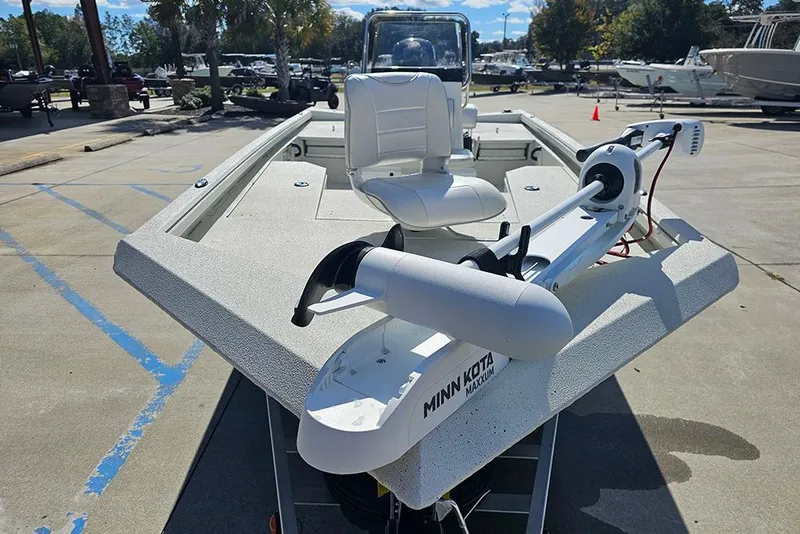 Slide: The Image of 2026 Ranger RB190 boat with Minn Kota trolling motor in a sunny outdoor setting. - 4
