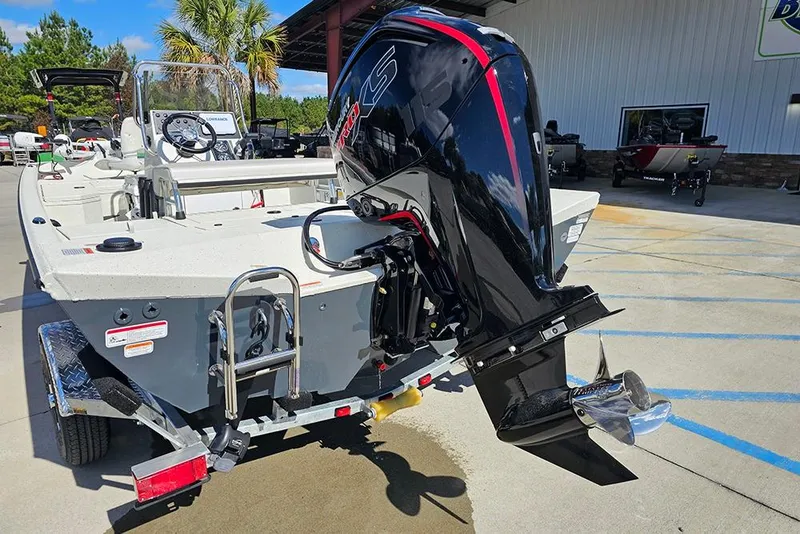 Slide: The Image of 2026 Ranger RB190 boat with powerful outboard motor, parked outdoors. - 9