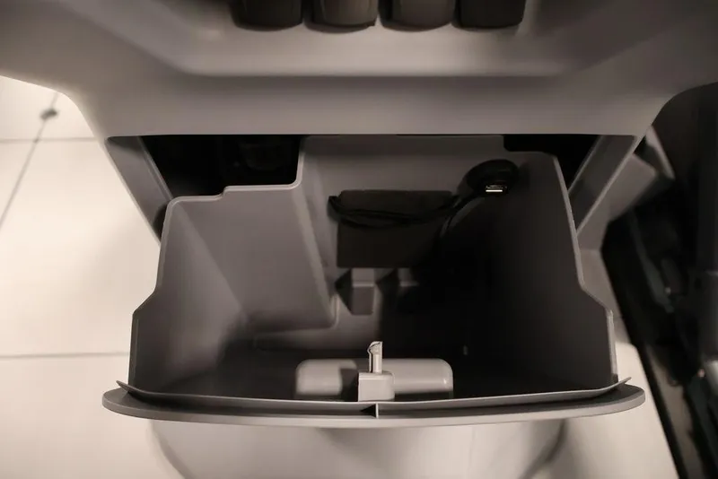 Slide: The Image of Storage compartment of 2025 Sea-Doo Switch Cruise Limited 21 with USB port. - 5