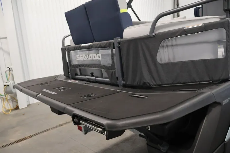 Slide: The Image of 2025 Sea-Doo Switch Cruise Limited 21 rear deck in a garage setting. - 8