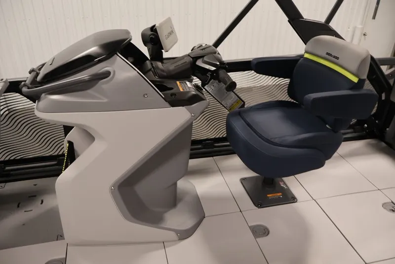 Slide: The Image of 2025 Sea-Doo Switch Cruise Limited 21 cockpit with steering console and comfortable seating. - 33