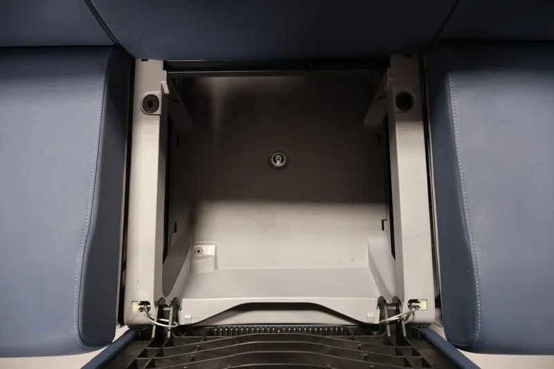 Slide: The Image of Storage compartment of 2025 Sea-Doo Switch Cruise Limited 21, featuring blue seating. - 27