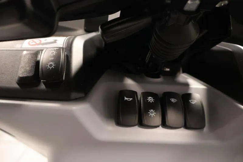 Slide: The Image of Control panel of 2025 Sea-Doo Switch Cruise Limited 21 with various switches and buttons. - 6