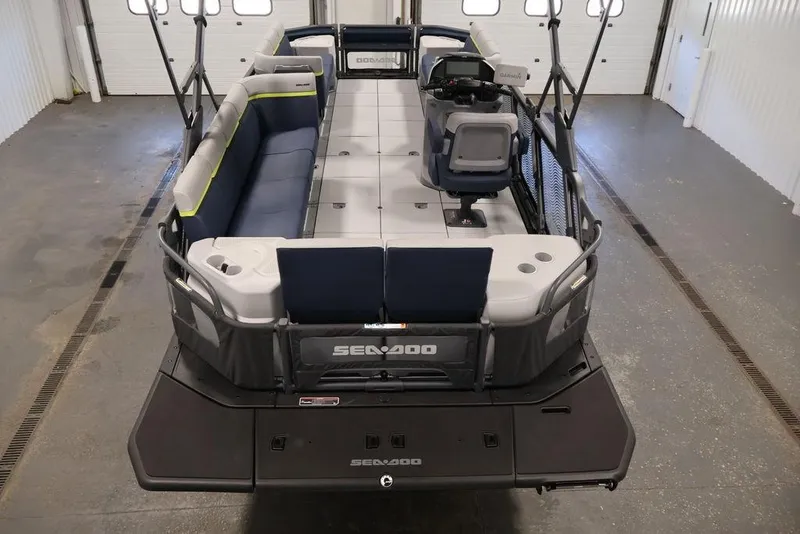 Slide: The Image of 2025 Sea-Doo Switch Cruise Limited 21 pontoon boat interior with seating and helm. - 20