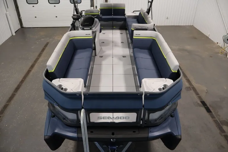 Slide: The Image of 2025 Sea-Doo Switch Cruise Limited 21 pontoon boat interior with spacious seating. - 17