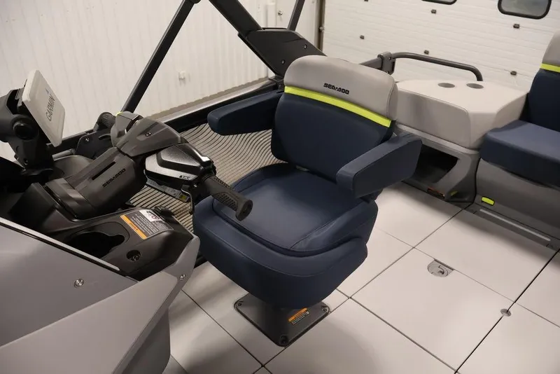 Slide: The Image of 2025 Sea-Doo Switch Cruise Limited 21 interior with steering and seating area. - 15