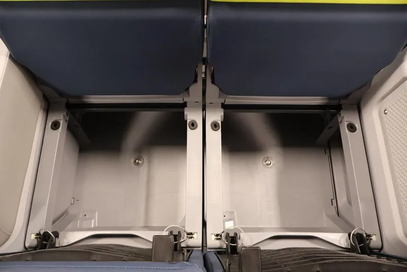 Slide: The Image of Under-seat storage compartments in 2025 Sea-Doo Switch Cruise Limited 21 boat. - 12
