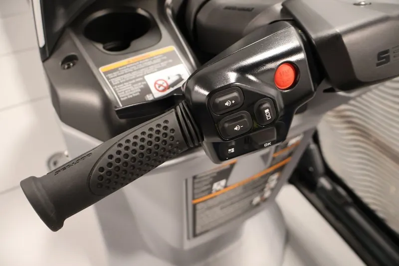 Slide: The Image of Close-up of 2025 Sea-Doo Switch Cruise Limited 21 handlebar controls. - 39