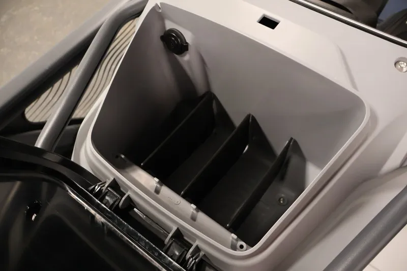 Slide: The Image of Storage compartment of 2025 Sea-Doo Switch Cruise Limited 21, featuring organized interior space. - 25