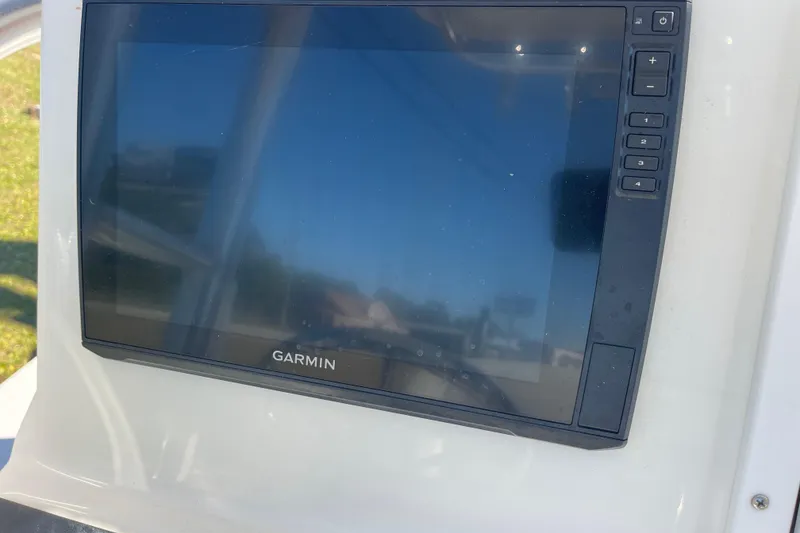 Slide: The Image of Garmin display on 2021 Bay Rider 219 Bay boat dashboard. - 17