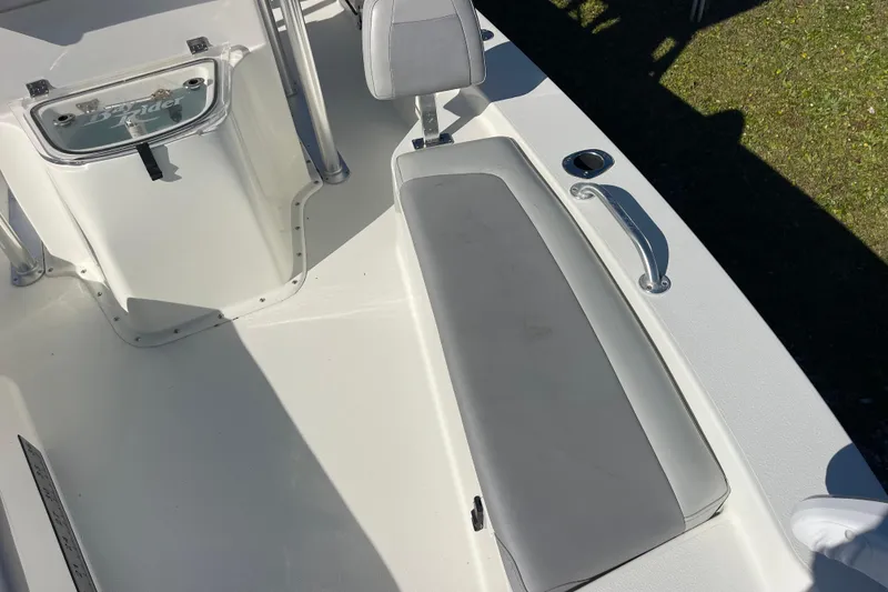 Slide: The Image of 2021 Bay Rider 219 Bay boat interior with seating and console details. - 30