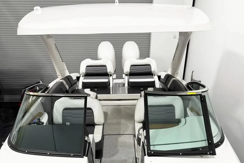 Slide: The Image of 2026 Regal LX9 boat interior with modern seating and sleek design. - 4