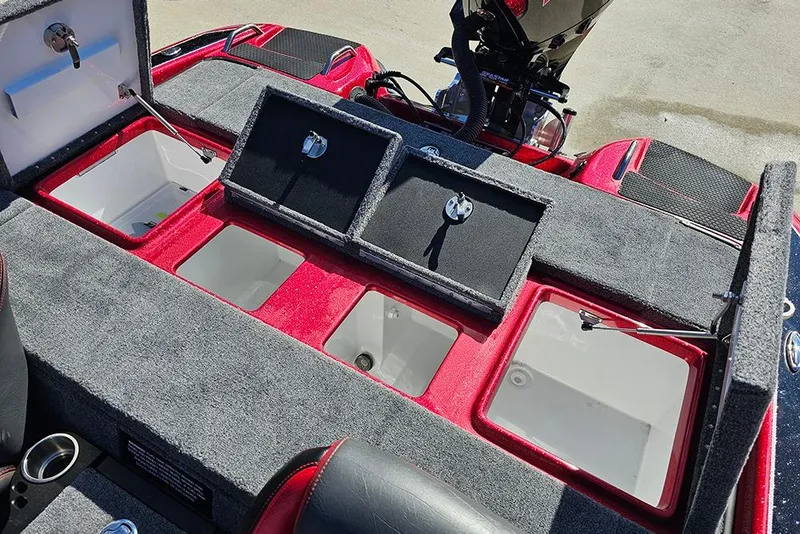Slide: The Image of 2026 Phoenix 819 ZXL boat storage compartments with open lids, showcasing interior space. - 12