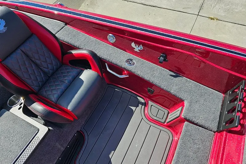 Slide: The Image of Luxurious interior of 2026 Phoenix 819 ZXL boat with red and black seating. - 13