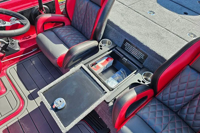 Slide: The Image of Red and black interior of 2026 Phoenix 819 ZXL boat with storage compartment. - 16