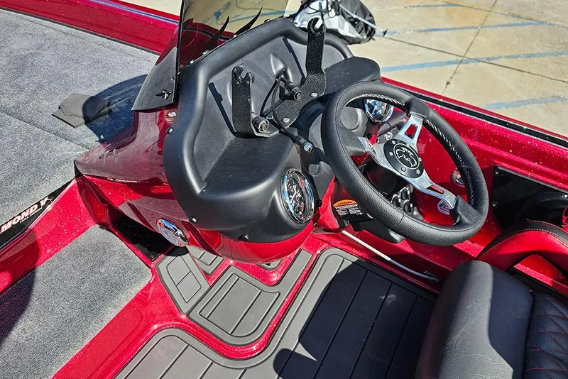 Slide: The Image of Red Phoenix 819 ZXL boat dashboard with steering wheel, 2026 model. - 17