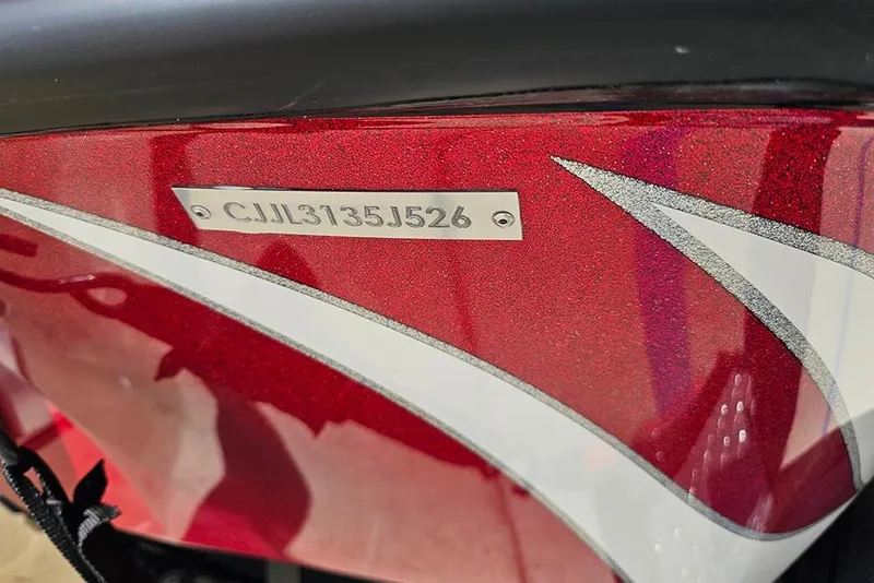 Slide: The Image of 2026 Phoenix 819 ZXL boat with red and white design, displaying serial number CJJL3135J526. - 25
