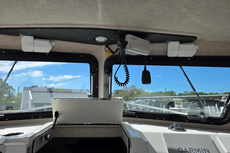 Slide: The Image of Interior view of 2026 Parker 257 Explorer boat with Garmin equipment. - 18