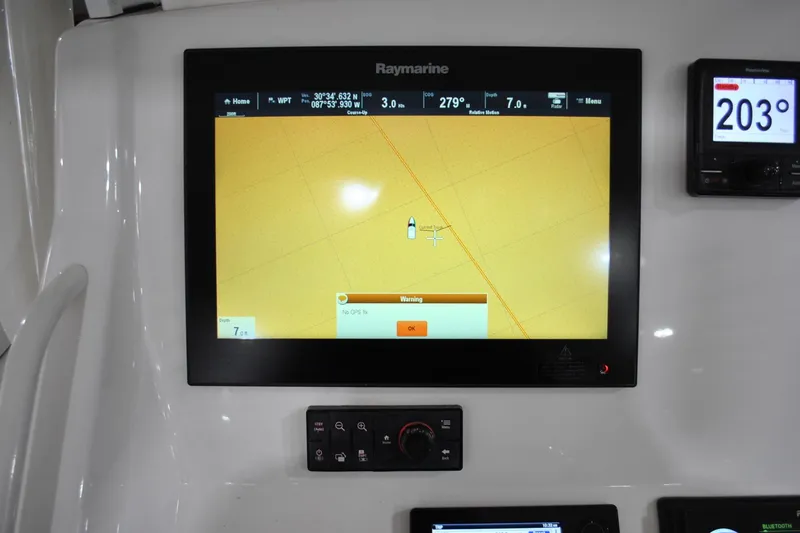 Slide: The Image of Raymarine navigation display on 2016 Regulator 34 Center Console boat dashboard. - 26