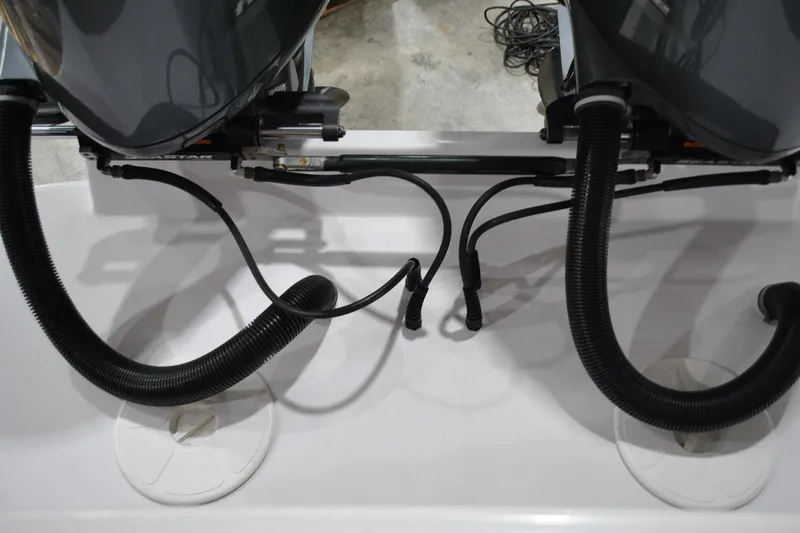Slide: The Image of 2016 Regulator 34 Center Console boat engine connections and cables. - 38