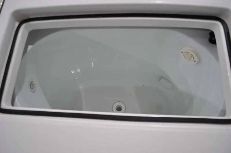 Slide: The Image of Livewell compartment of 2016 Regulator 34 Center Console boat, empty and clean. - 39