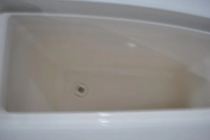 Slide: The Image of 2016 Regulator 34 Center Console boat storage compartment interior. - 41