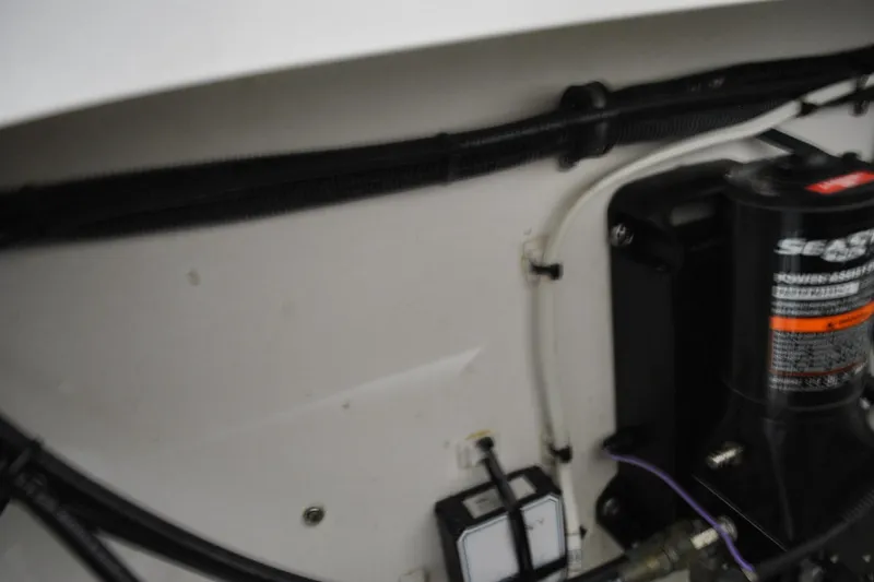 Slide: The Image of 2016 Regulator 34 Center Console boat wiring and components close-up. - 48