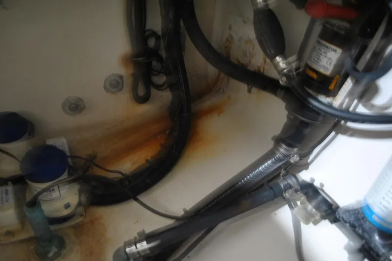 Slide: The Image of 2016 Regulator 34 Center Console boat wiring and plumbing details. - 50