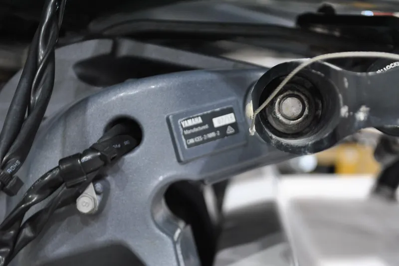 Slide: The Image of Close-up of Yamaha engine component on 2016 Regulator 34 Center Console boat. - 73