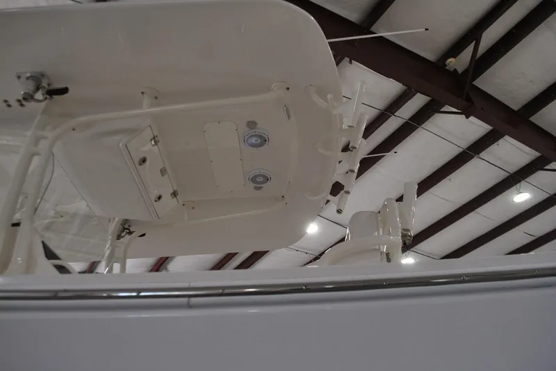 Slide: The Image of 2016 Regulator 34 Center Console boat interior, showcasing ceiling details and lighting. - 76