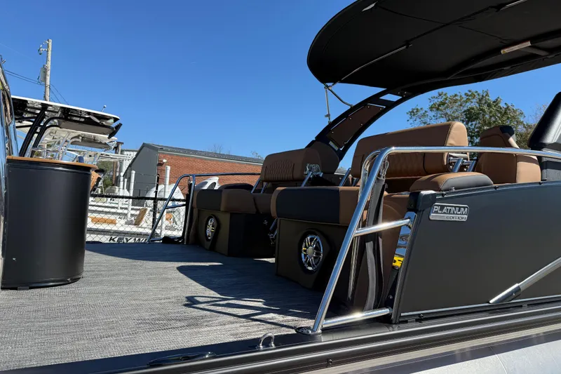 Slide: The Image of 2026 Avalon Catalina Quad Lounger Windshield boat with luxurious seating and sleek design. - 13