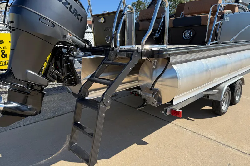 Slide: The Image of 2026 Avalon Catalina Quad Lounger Windshield boat with Suzuki outboard motor and trailer. - 14