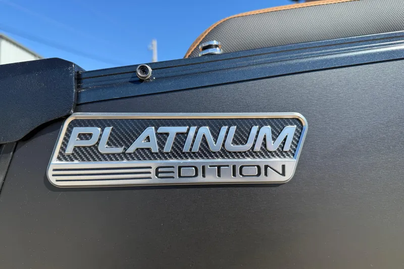 Slide: The Image of 2026 Avalon Catalina Quad Lounger Windshield, Platinum Edition badge detail. - 16