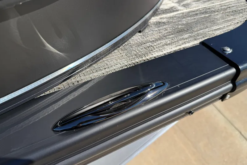 Slide: The Image of 2026 Avalon Catalina Quad Lounger Windshield, close-up of sleek black detailing. - 17