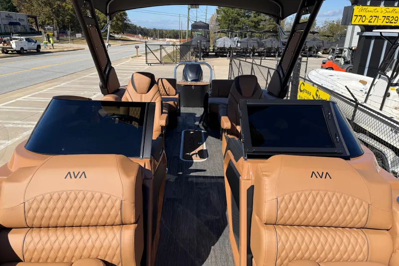 Slide: The Image of 2026 Avalon Catalina Quad Lounger Windshield with luxurious tan seating and modern design. - 28