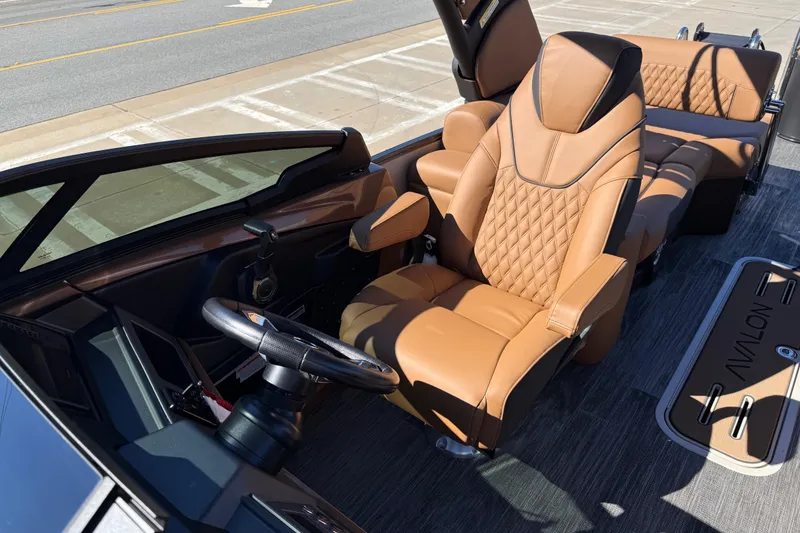 Slide: The Image of Luxurious interior of 2026 Avalon Catalina Quad Lounger Windshield with tan leather seating. - 31
