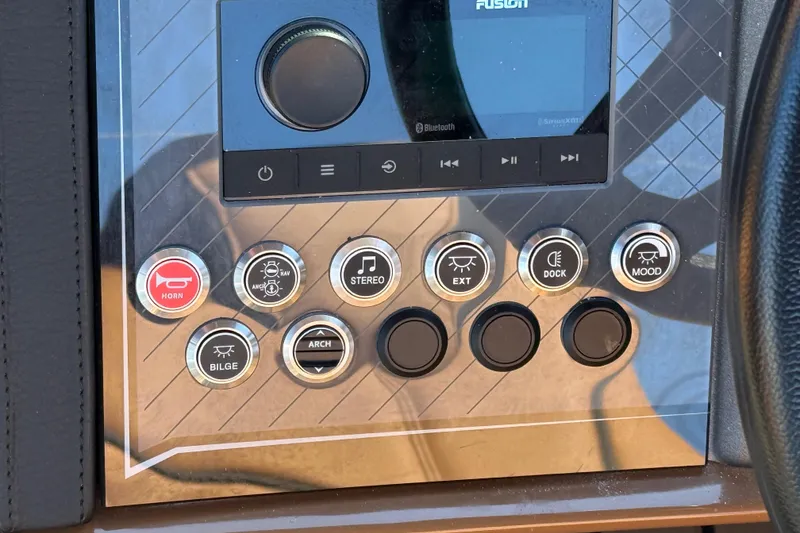 Slide: The Image of Control panel of 2026 Avalon Catalina Quad Lounger Windshield with various function buttons. - 38