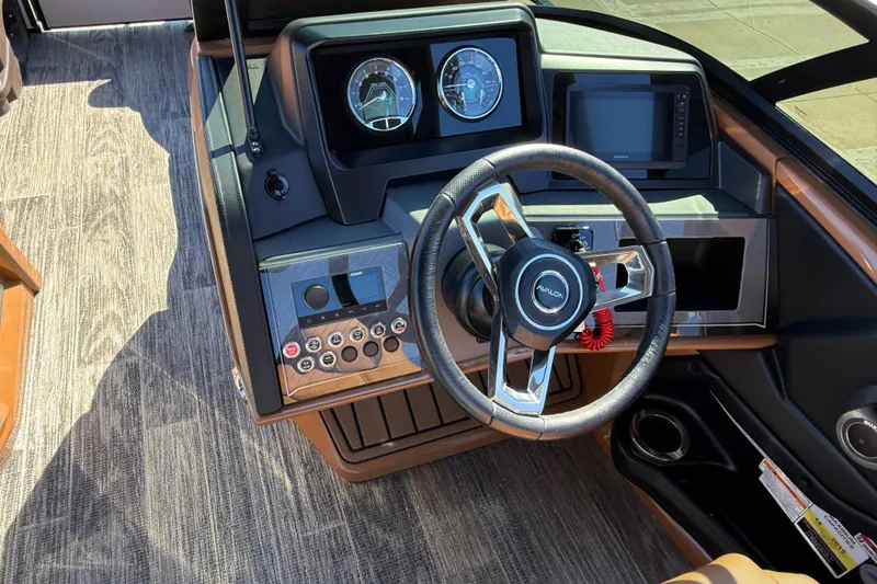 Slide: The Image of 2026 Avalon Catalina Quad Lounger Windshield dashboard with steering wheel and control panel. - 39
