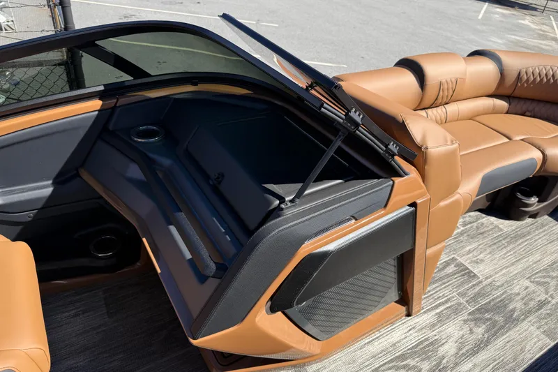 Slide: The Image of 2026 Avalon Catalina Quad Lounger Windshield interior with luxurious brown seating and modern design. - 41