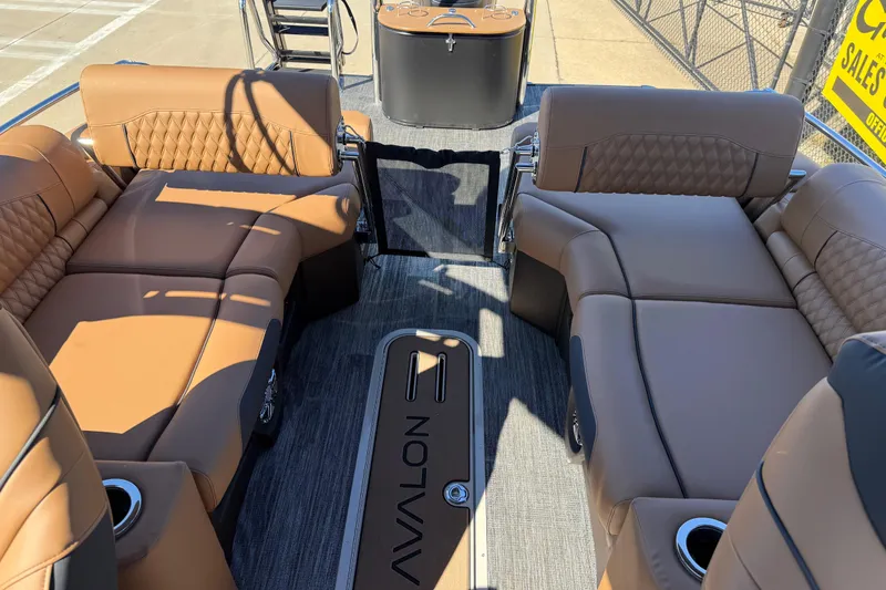 Slide: The Image of Luxurious interior of 2026 Avalon Catalina Quad Lounger Windshield boat with plush seating. - 47