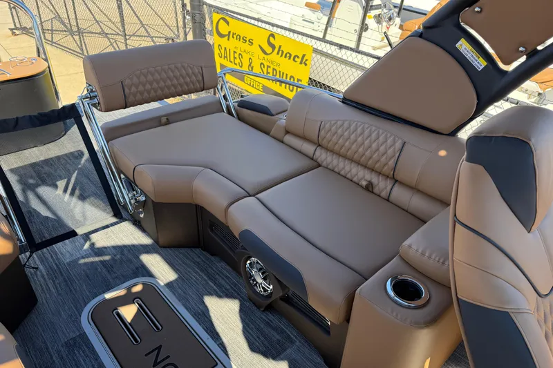 Slide: The Image of Luxurious seating on 2026 Avalon Catalina Quad Lounger Windshield boat, featuring plush upholstery. - 49